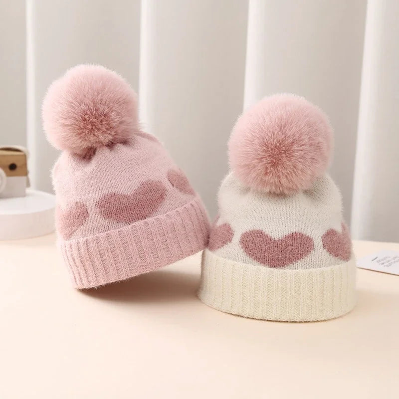 Lioraitiin Baby Girl Winter Hat Cute Heart Pattern Plush Pom Knit Beanie Warm Hospital Cap For Infant Cold Weather Accessories
