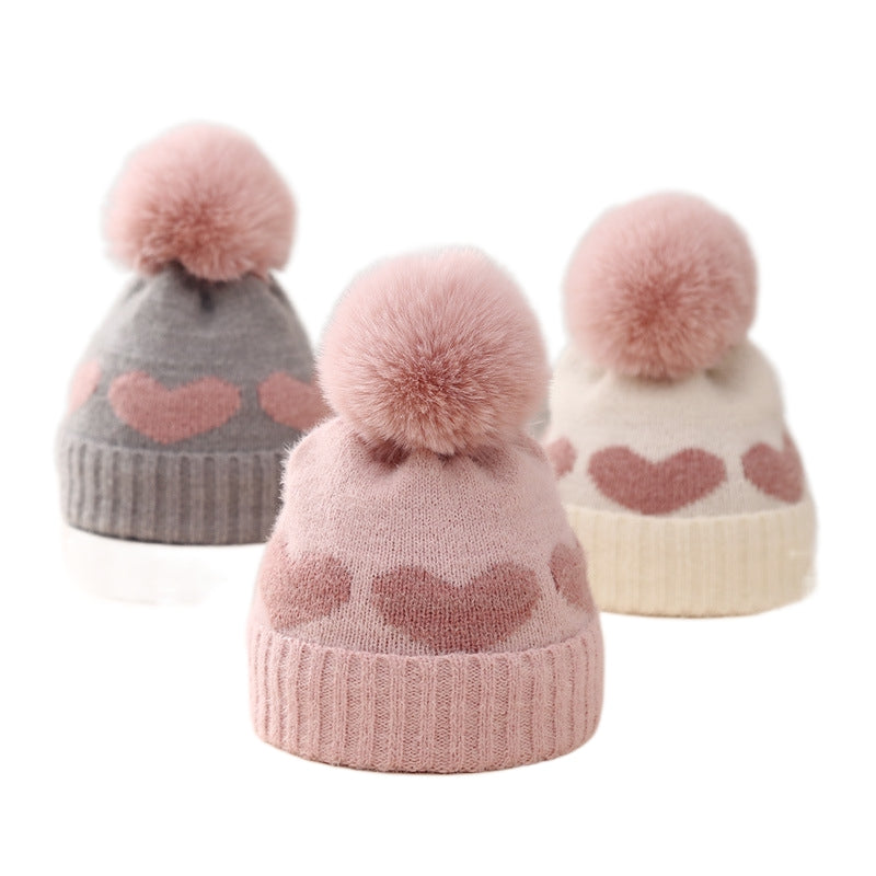 Lioraitiin Baby Girl Winter Hat Cute Heart Pattern Plush Pom Knit Beanie Warm Hospital Cap For Infant Cold Weather Accessories