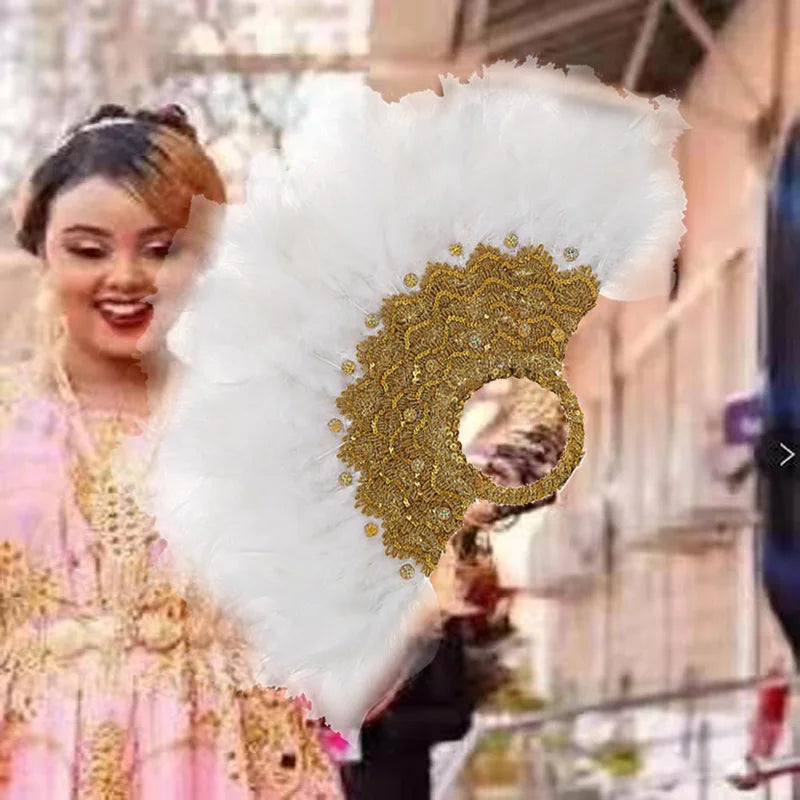 An elegant feather fan, pure white feather decoration, romantic fan, the perfect choice for photography props